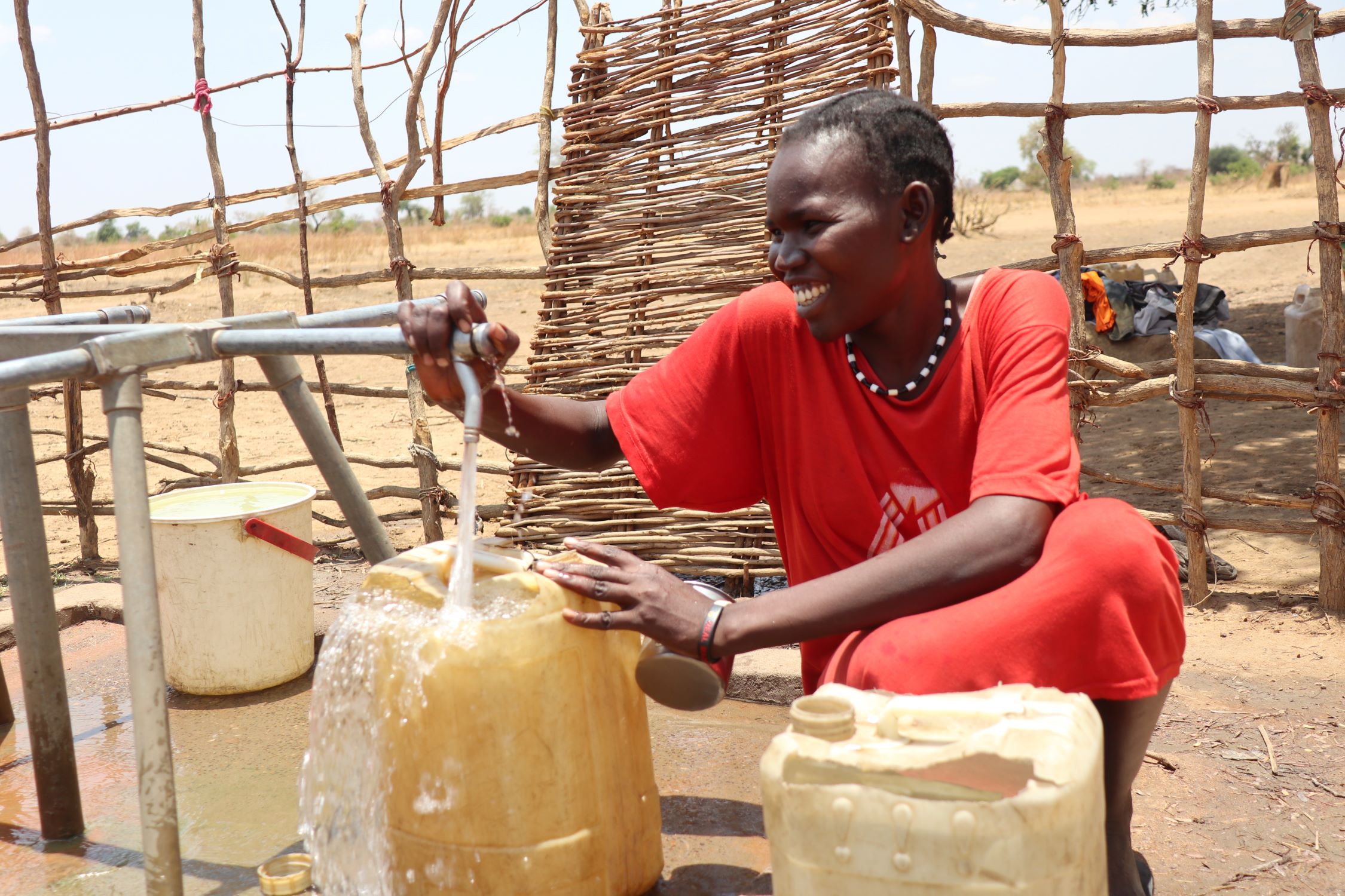 Woman getting water