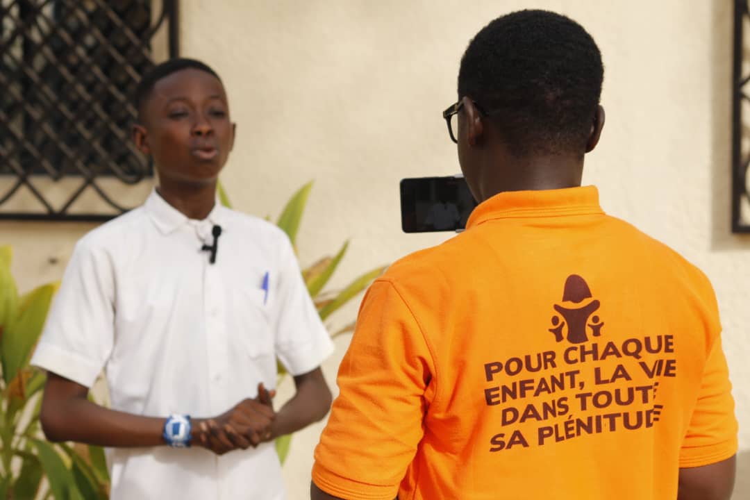 Cornelius recording content for the ENOUGH campaign, 2024 (World Vision's campaign for nutritious food for every child.)