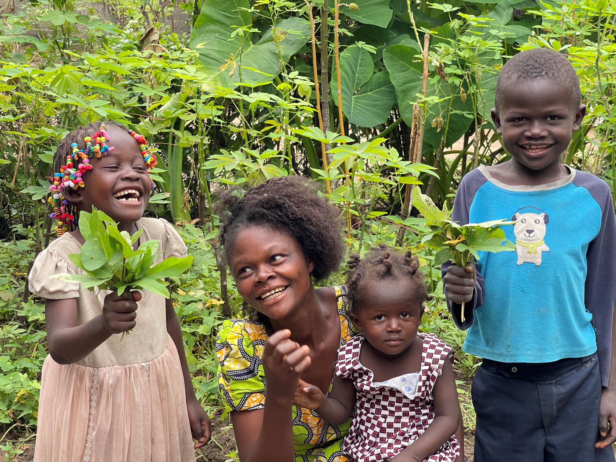 Mother and children from DRC smiling