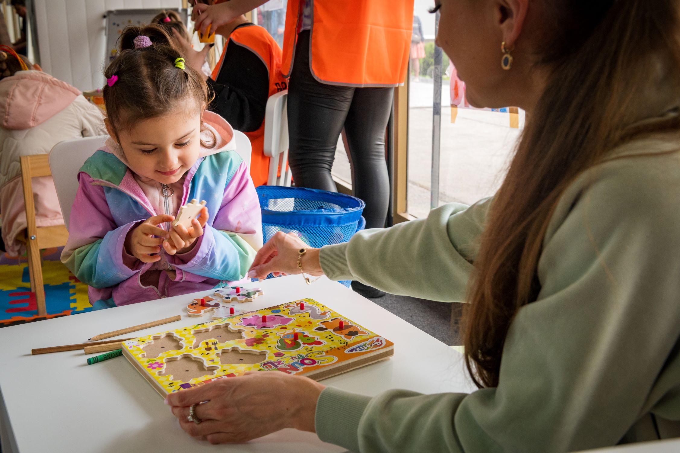 Ukrainian mother and child at refugee centre in Romania
