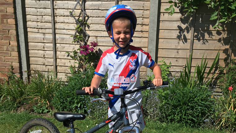 Young boy with his bike