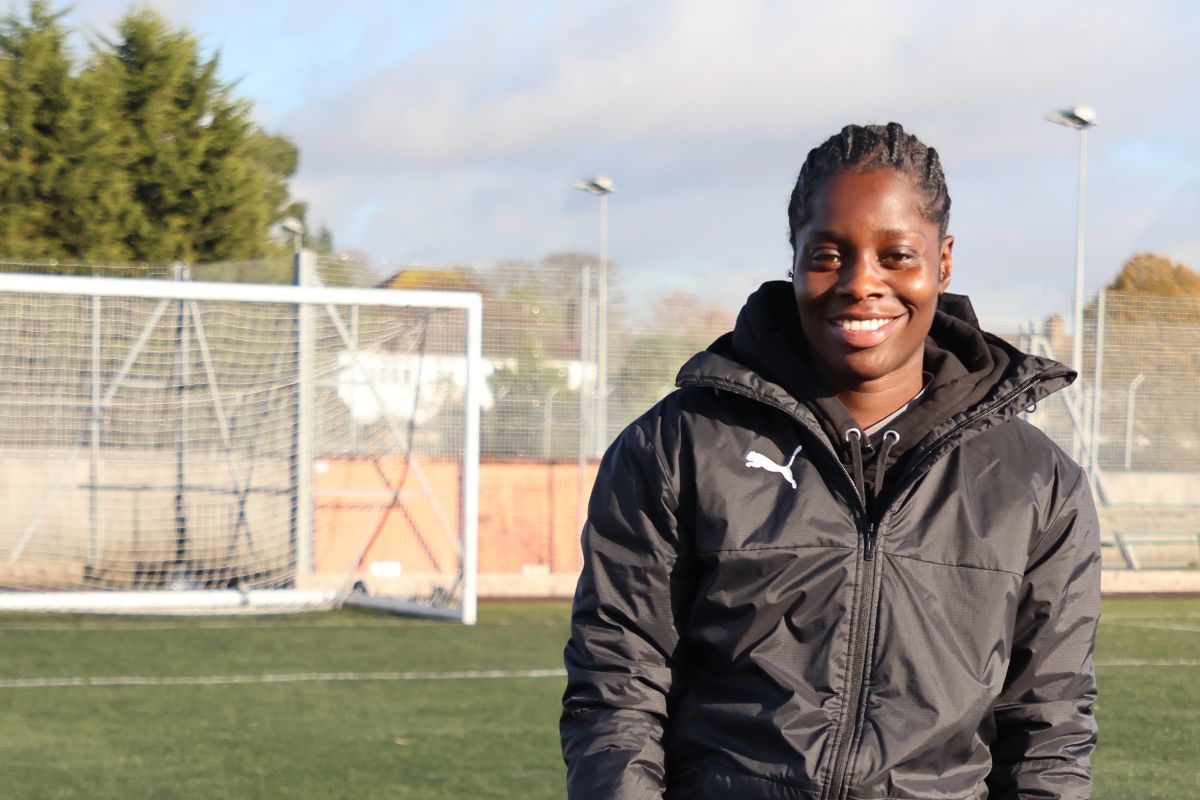 Freda Ayisi with a goal behind her