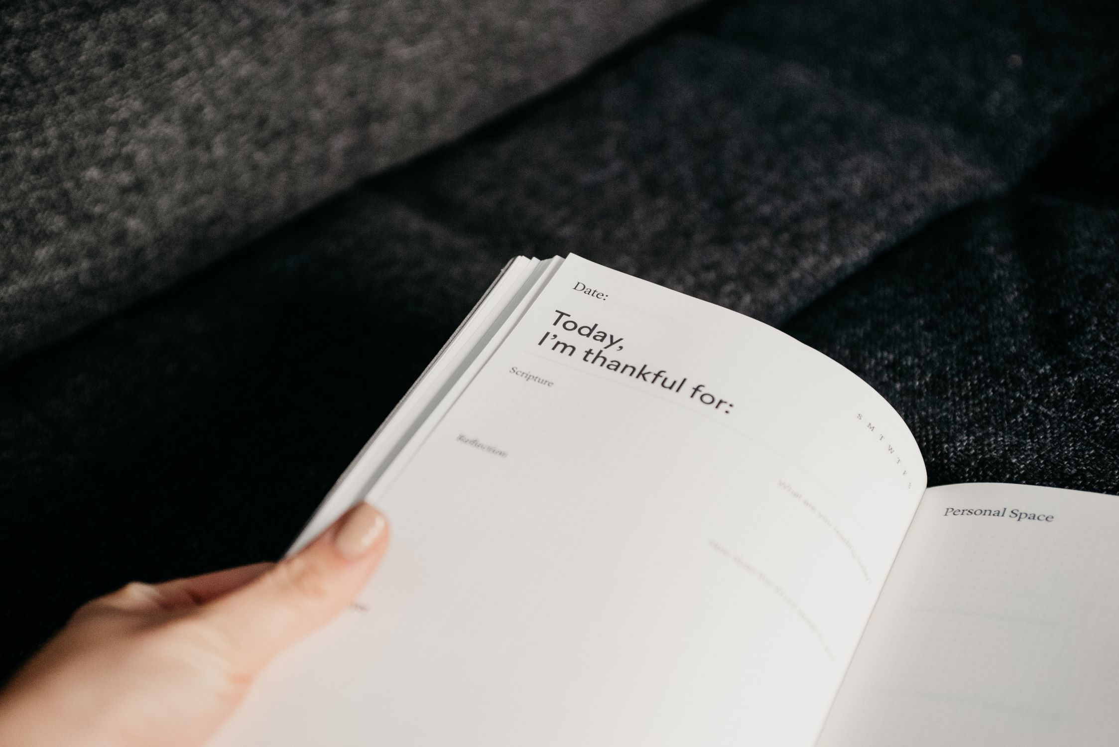 Prayer journal held open on a page titled 'today I'm thankful for'